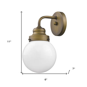 Homeroots One Light Gold Wall Sconce With Round Glass Shade   398700