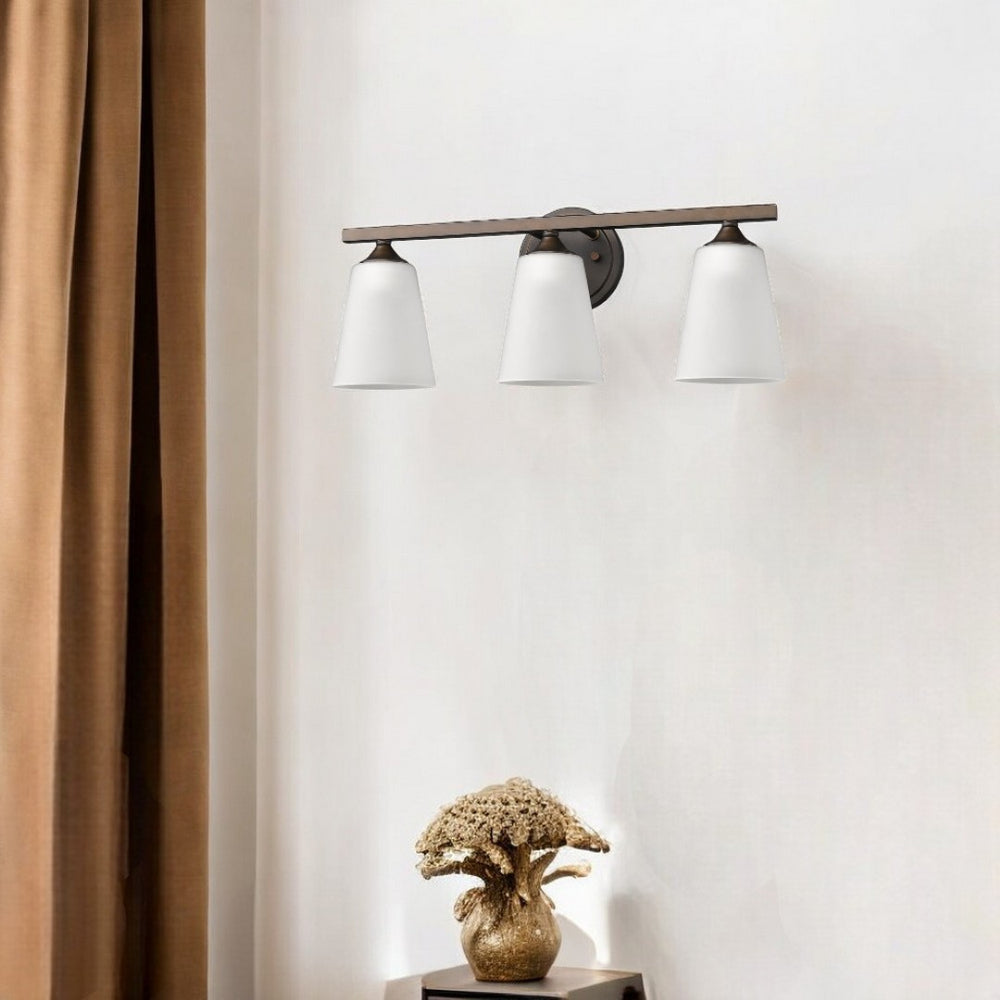 HomeRoots Three Light Bronze Metal Vanity Wall Fixture - Stylish Industrial Design for Bathrooms & Hallways 398710