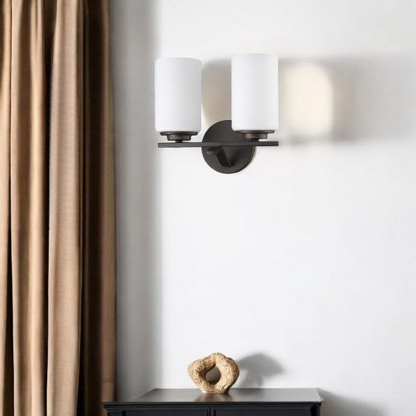 HomeRoots Two Light Bronze Wall Sconce with Frosted Glass Shades – Elegant Ambient Lighting for Any Room 398735