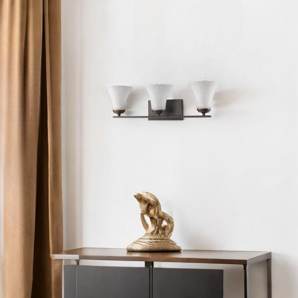 HomeRoots Three Light Bronze Wall Fixture with Elegant Tapered Glass Shades for Modern Home Décor and Illumination 398751
