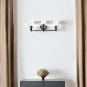 HomeRoots Three Light Matte Black Wall Sconce with Clear Glass Shades - Modern Elegance for Any Room 398763