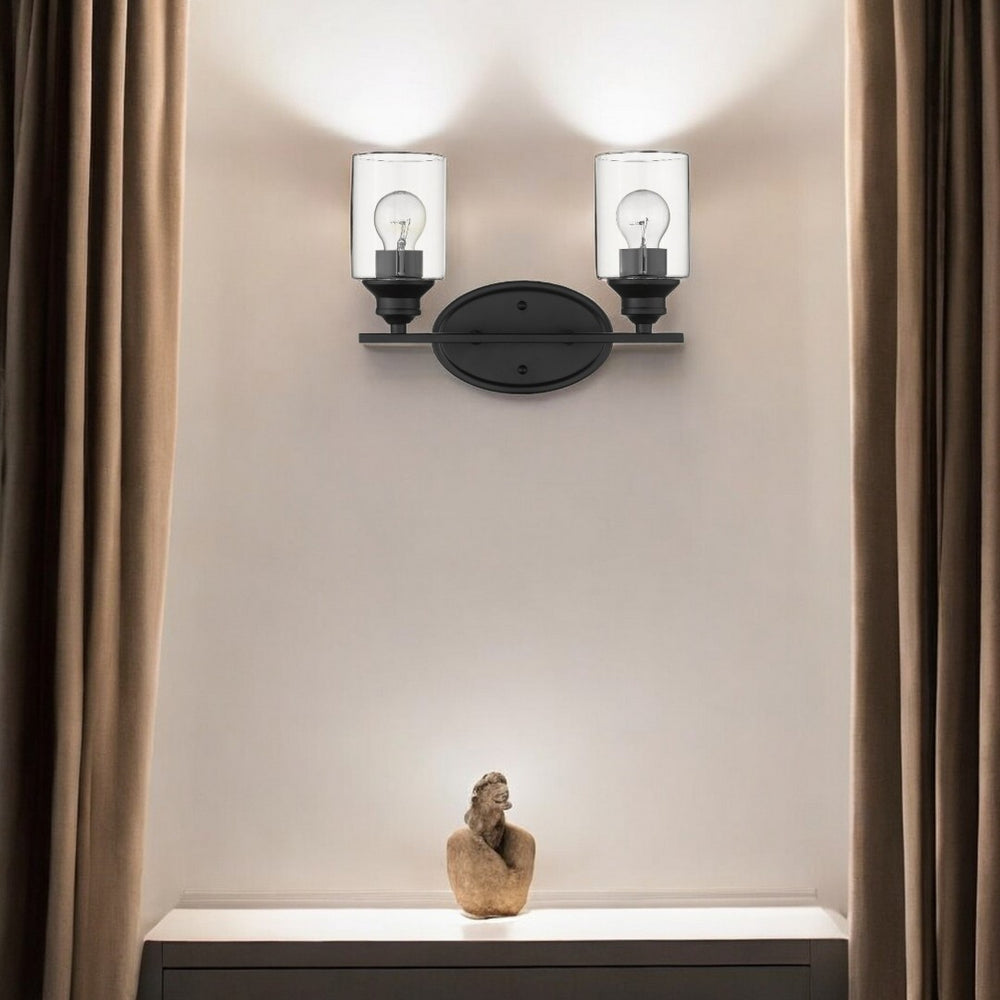 HomeRoots Two Light Matte Black Wall Sconce with Clear Glass Shades – Modern Design for Any Room 398776