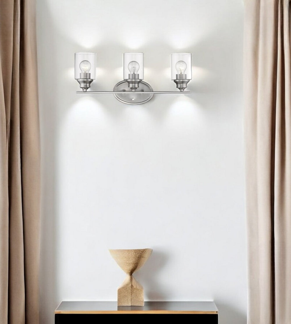 HomeRoots Three Light Silver Wall Sconce with Clear Glass Shades – Modern Elegance for Stylish Spaces 398781