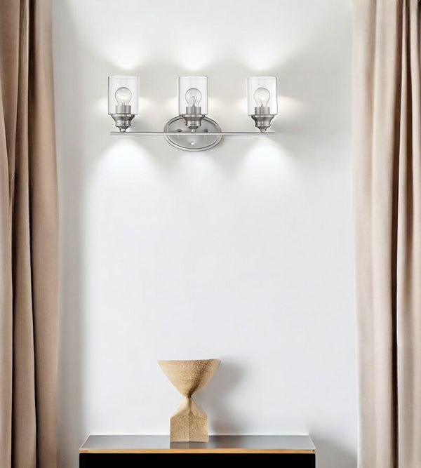 HomeRoots Three Light Silver Wall Sconce with Clear Glass Shades – Modern Elegance for Stylish Spaces 398781