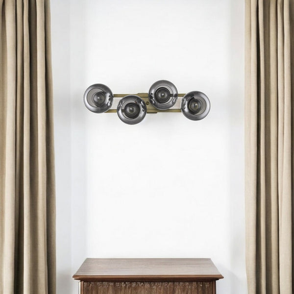 HomeRoots Lunette 4-Light Aged Brass Sconce – Mid-Century Modern Fixture with Smoked Glass for Ambiance 398790