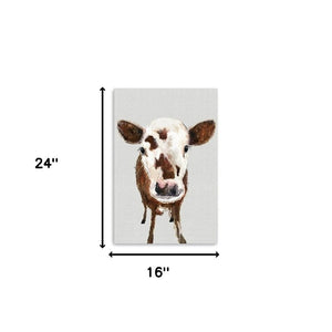 HomeRoots 24" Brown and White Baby Cow Face Canvas Wall Art - Modern Farmhouse Charm for Any Room Decor 16"x24" 398980