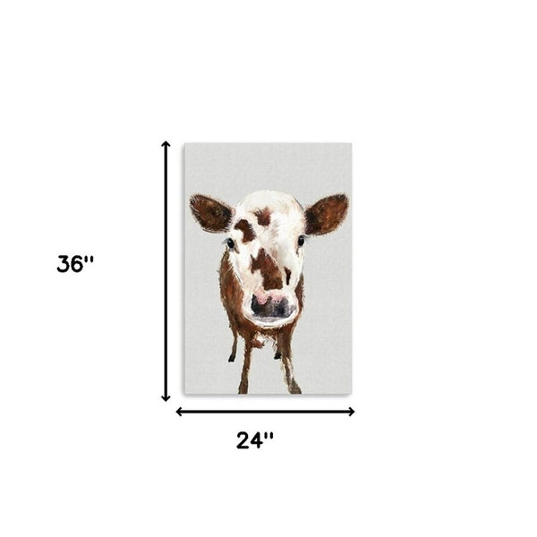 HomeRoots 24" Brown and White Baby Cow Face Canvas Wall Art - Modern Farmhouse Charm for Any Room Decor 24"x36" 398981