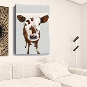 HomeRoots 24" Brown and White Baby Cow Face Canvas Wall Art - Modern Farmhouse Charm for Any Room Decor 32"x48" 398982