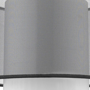 HomeRoots 32" Modern Black and Silver Metal Column Lamp with Elegant Black-and-White Drum Shade Accent 399129