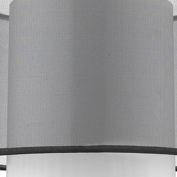 HomeRoots 32" Modern Black and Silver Metal Column Lamp with Elegant Black-and-White Drum Shade Accent 399129