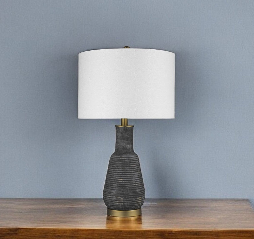 HomeRoots 26" Distressed Black and Gold Ceramic Table Lamp with White Shade - Rustic Charm Meets Modern Elegance 399180