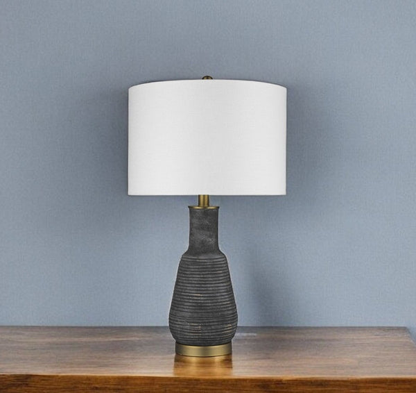 HomeRoots 26" Distressed Black and Gold Ceramic Table Lamp with White Shade - Rustic Charm Meets Modern Elegance 399180