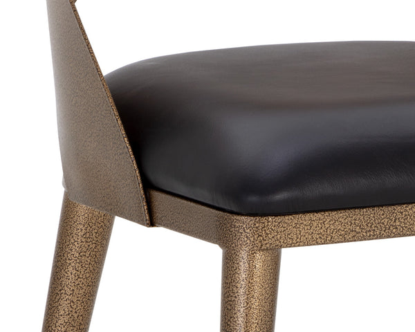 Sunpan Dezirae Dining Chair - Stylish Curved Back Design with Genuine Leather Seat and Iron Legs, Handcrafted Antique Brass / Charcoal Black Leather