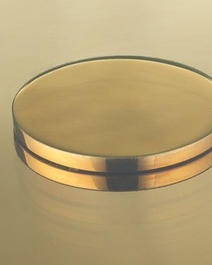 Currey & Company Lemy Brass Finish Round Coffee Table Sculpted Steel Base with Tempered Glass Top Polished Brass / Clear 4000-0217