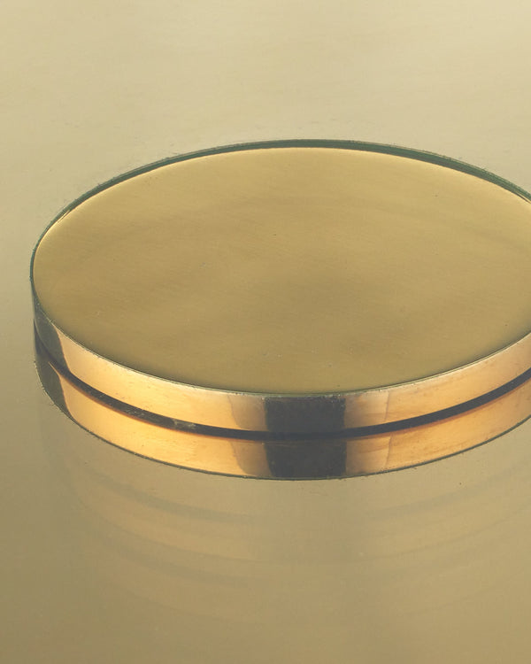 Currey & Company Lemy Brass Finish Round Coffee Table Sculpted Steel Base with Tempered Glass Top Polished Brass / Clear 4000-0217