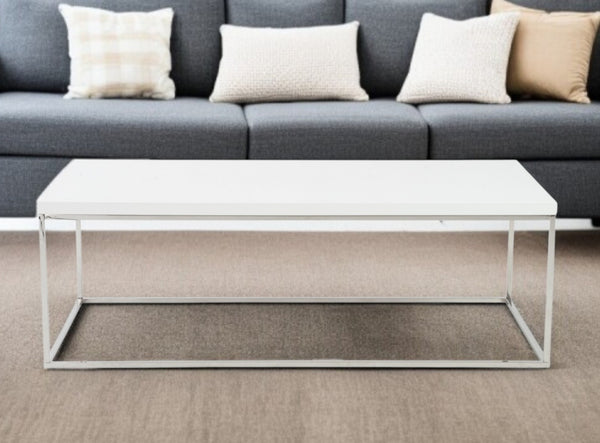 HomeRoots 47" White and Silver Coffee Table - Modern High-Gloss MDF Top with Polished Metal Frame Design 400549