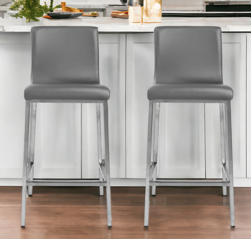 Homeroots Set Of Two 26" Gray And Silver Faux Leather And Steel Low Back Counter Height Bar Chairs   400623
