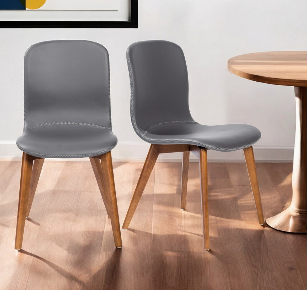 Homeroots Set Of Two Gray Faux Leather And Walnut Dining Or Side Chairs   400645