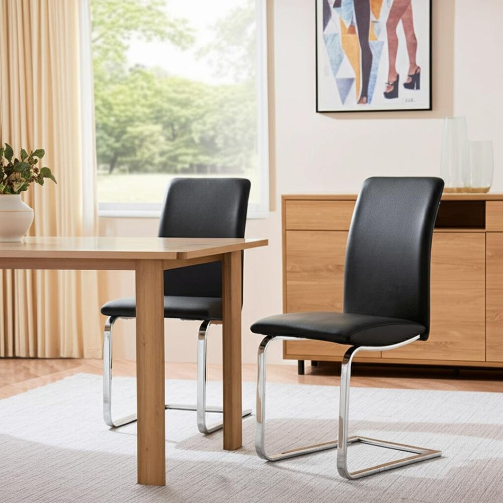 HomeRoots Set of Two Modern Black & Silver Upholstered Leather Dining Chairs for Stylish Home Décor 400659