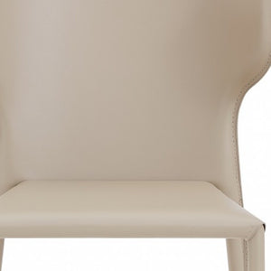 HomeRoots Set of Two Beige Upholstered Leather Dining Chairs with Curved Back for Modern Spaces & Comfort 400704