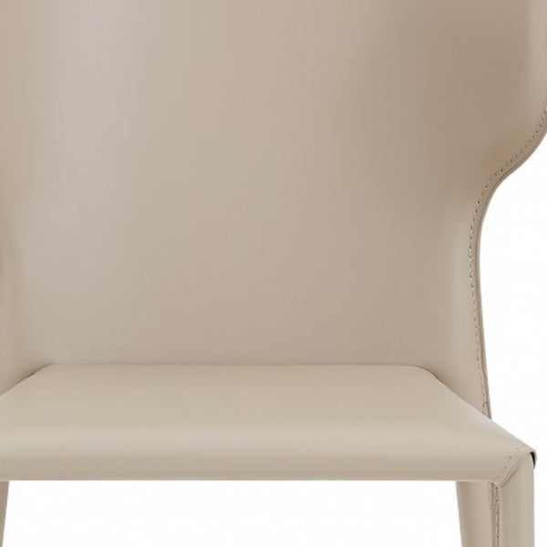 HomeRoots Set of Two Beige Upholstered Leather Dining Chairs with Curved Back for Modern Spaces & Comfort 400704