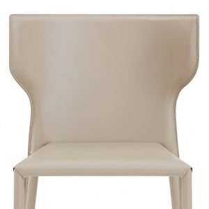 HomeRoots Set of Two Beige Upholstered Leather Dining Chairs with Curved Back for Modern Spaces & Comfort 400704
