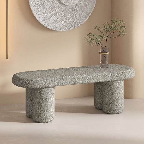 Worldwide Home Furnishings Azoro-bench-cream: Elegant Fully-upholstered Oval Bench With Sturdy Pedestal Legs For Modern Spaces Warm Grey Boucle Fabric 401-163wgy