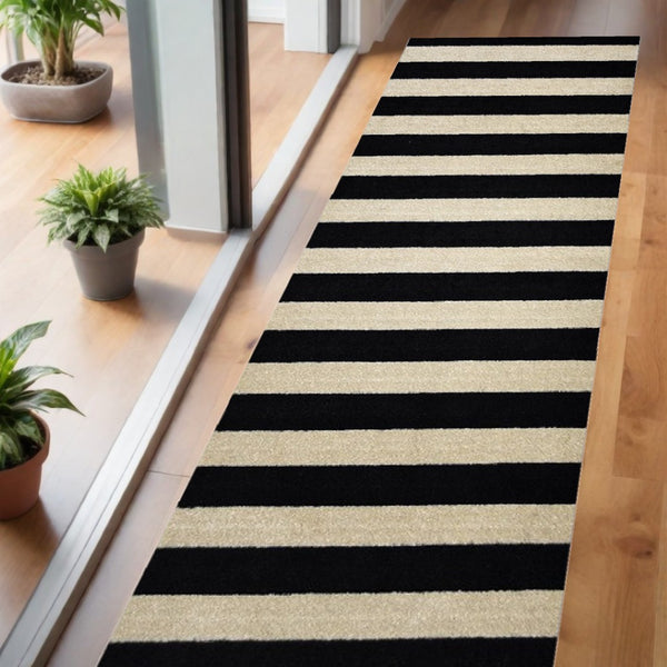 HomeRoots 2' X 6' Stylish Black and Tan Wide Stripe Washable Runner Rug for High Traffic Areas & Easy Care 401032