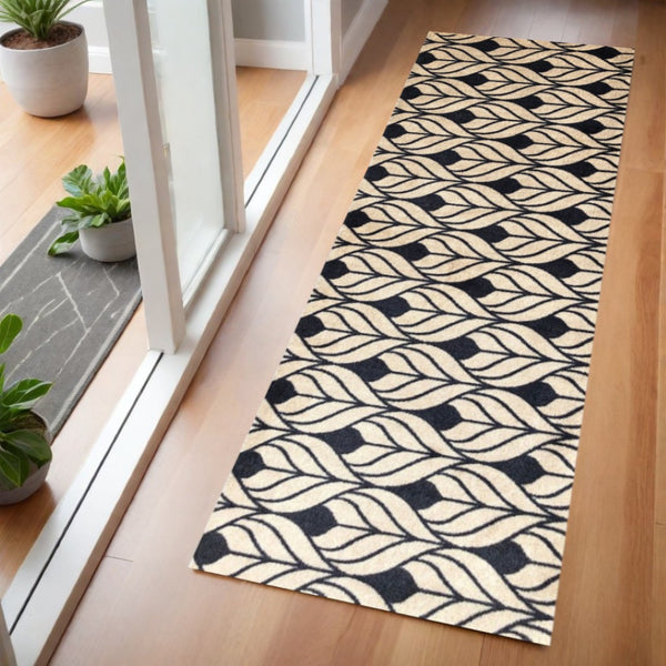 HomeRoots 2' X 6' Stylish Graphite & Tan Abstract Leaves Washable Runner Rug for Modern Hallways & Entryways 401078