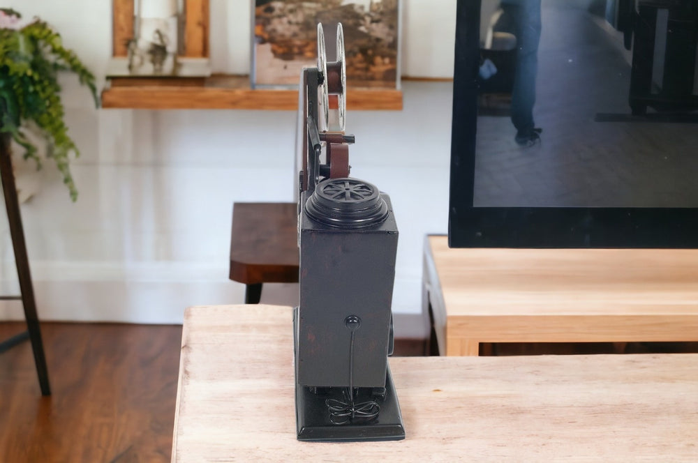 Homeroots 14" Black Metal Hand Painted Figurine Tabletop Sculpture  Metal 401161