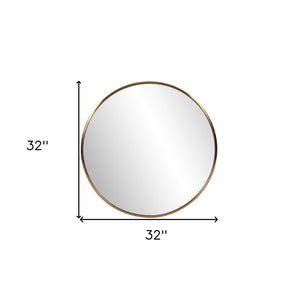 HomeRoots 32" Antiqued Brushed Brass Round Wall Mirror – Timeless Elegance for Any Room, Brighten Your Space! 401208