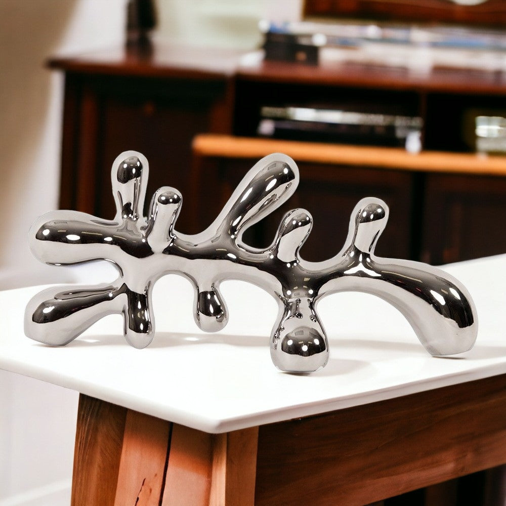 Homeroots 7" Silver Metal Tabletop Sculpture  Metal 401225