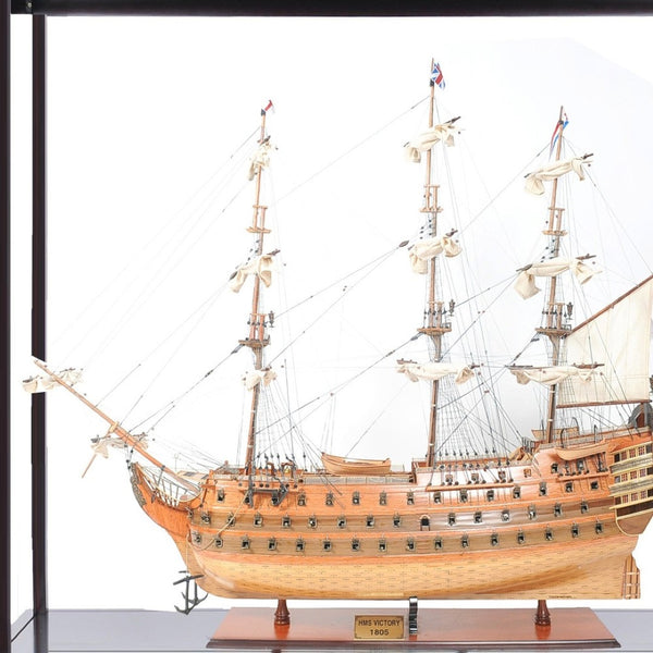 HomeRoots 75" HMS Victory Tabletop Sculpture - Handcrafted Solid Wood Nautical Decor with Display Case & Name Plate 401841