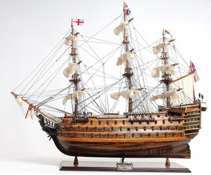 HomeRoots 27" Hand-Painted Solid Wood Model Boat Sculpture - Nautical Charm for Home Décor & Collectors 401842