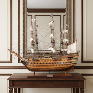 HomeRoots 27" Hand-Painted Solid Wood Model Boat Sculpture - Nautical Charm for Home Décor & Collectors 401842