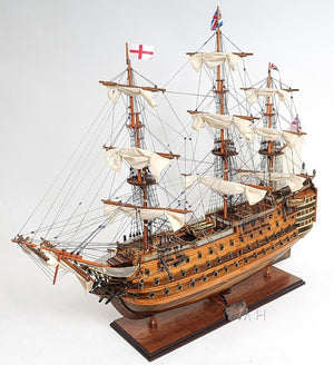 HomeRoots 27" Hand-Painted Solid Wood Model Boat Sculpture - Nautical Charm for Home Décor & Collectors 401842
