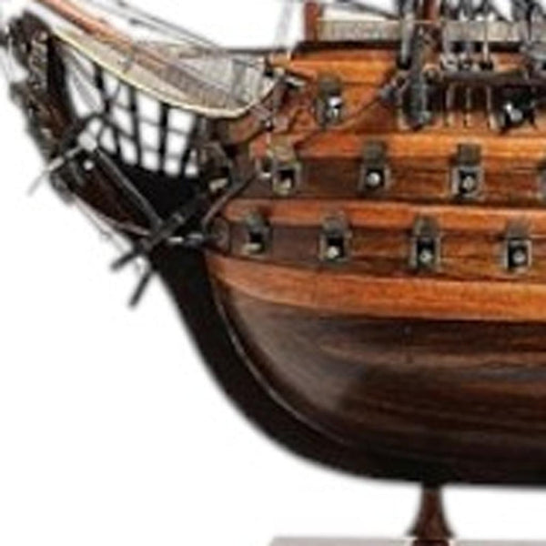 HomeRoots 27" Hand-Painted Solid Wood Model Boat Sculpture - Nautical Charm for Home Décor & Collectors 401842