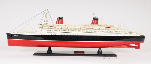 HomeRoots 11" Black and Red Hand-Painted Decorative Boat – Unique Nautical Centerpiece for Coastal Decor 401883