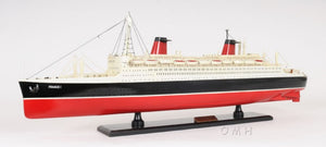 HomeRoots 11" Black and Red Hand-Painted Decorative Boat – Unique Nautical Centerpiece for Coastal Decor 401883