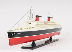 HomeRoots 11" Black and Red Hand-Painted Decorative Boat – Unique Nautical Centerpiece for Coastal Decor 401883
