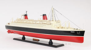 HomeRoots 11" Black and Red Hand-Painted Decorative Boat – Unique Nautical Centerpiece for Coastal Decor 401883