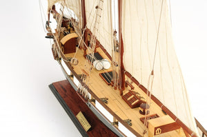 HomeRoots 26" Hand-Painted Solid Wood Model Boat - Elegant Black & White Nautical Decor for Home or Office 401914