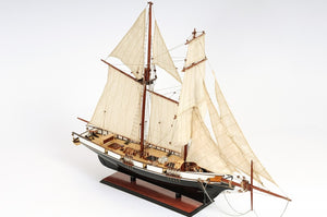 HomeRoots 26" Hand-Painted Solid Wood Model Boat - Elegant Black & White Nautical Decor for Home or Office 401914