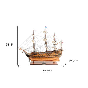 HomeRoots 32" Hand-Painted HMS Victory Model Boat - Elegant Solid Wood Nautical Decor for Collectors & Gift-Giving 401973