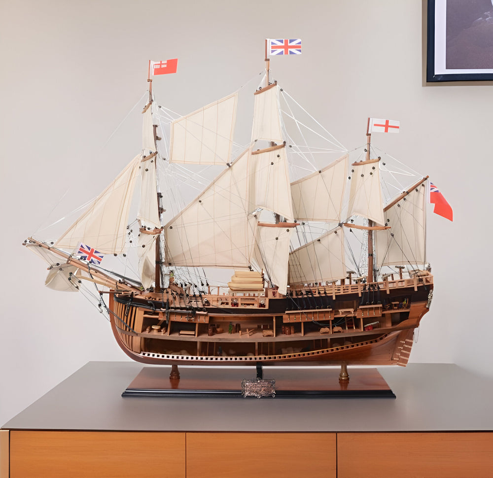 Homeroots 34" Wood Brown Solid Wood Hand Painted Hms Endeavour 1768 Open Hull Model Boat  Solid Wood 401976