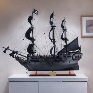Homeroots 29" Black Black Pearl Pirate Boat Hand Painted Decorative Boat  Solid Wood 401980