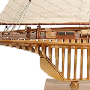 46 Inch Handcrafted Solid Wood Sailboat Model Decor Piece for Coastal Living Spaces