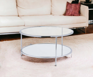 Homeroots 34" Chrome Glass And Metal Round Mirrored Coffee Table   402099