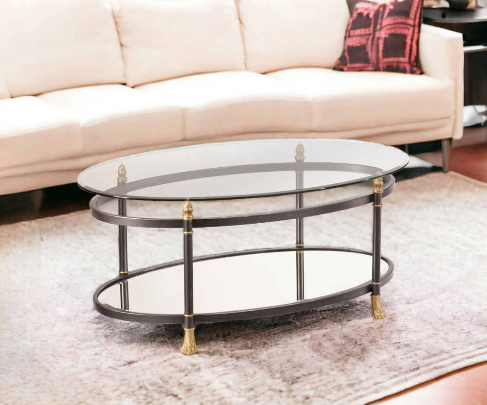 Homeroots 42" Gray Glass And Metal Oval Mirrored Coffee Table   402100
