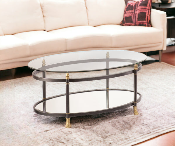 Homeroots 42" Gray Glass And Metal Oval Mirrored Coffee Table   402100